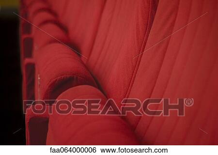 Stock Photograph - Empty theater seats, cropped. Fotosearch