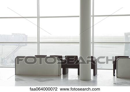 Empty waiting area in airport terminal View Large Photo Image Stock Image - Empty waiting area in airport terminal. Fotosearch
