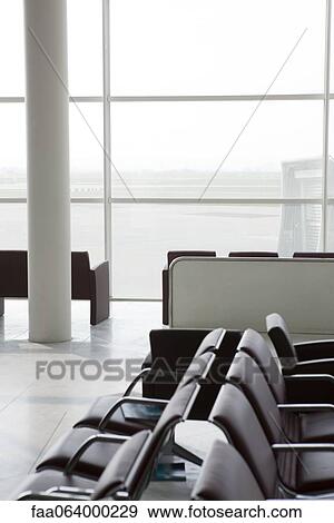 Stock Photo - Empty waiting area in airport terminal. Fotosearch