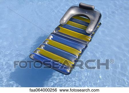 Float in swimming pool View Large Photo Image Stock Photograph - Float in swimming pool. Fotosearch