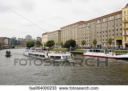 Stock Image - Germany, Berlin, tour boat on the River Spree. Fotosearch
