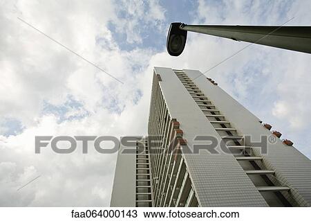 High rise building, low angle view View Large Photo Image Stock Image - High rise building, low angle view. Fotosearch