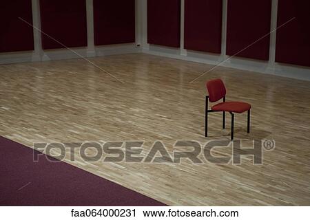 Lone chair in empty room View Large Photo Image Stock Image - Lone chair in empty room. Fotosearch