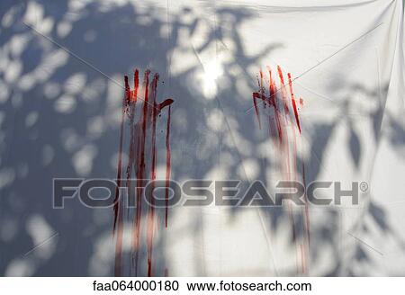 Stock Image - Red handprints on white sheet. Fotosearch