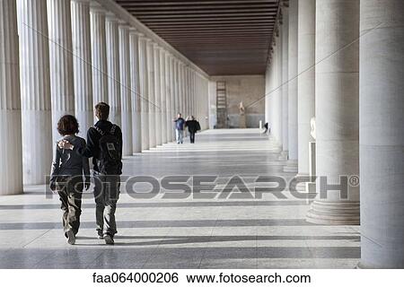 Tourists walking thorugh the Stoa of Attalos in the Ancient Agora, Athens, Greece View Large Photo Image Stock Photograph - Tourists walking thorugh the Stoa of Attalos in the Ancient Agora, Athens, Greece. Fotosearch