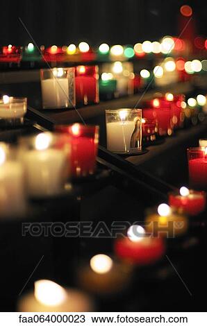 Votive candles burning in church View Large Photo Image Stock Image - Votive candles burning in church. Fotosearch