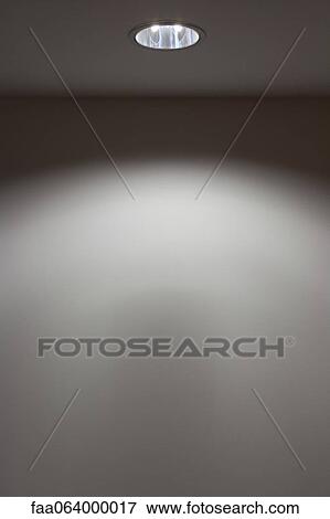 Wall illuminated by ceiling light View Large Photo Image Stock Photo - Wall illuminated by ceiling light. Fotosearch