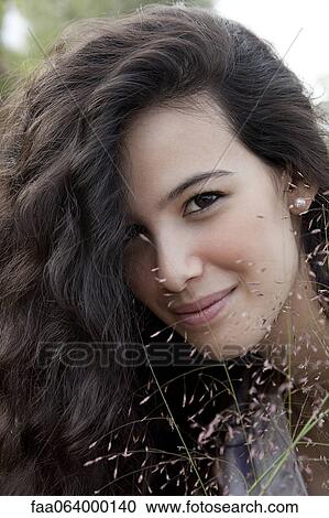 Stock Image - Young woman, portrait. Fotosearch