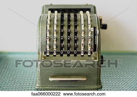 Stock Image - Antique adding machine. Fotosearch