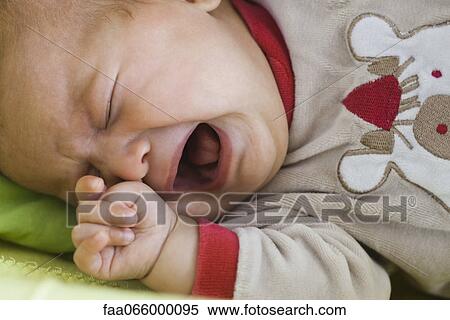 Baby crying, portrait View Large Photo Image Stock Photography - Baby crying, portrait. Fotosearch