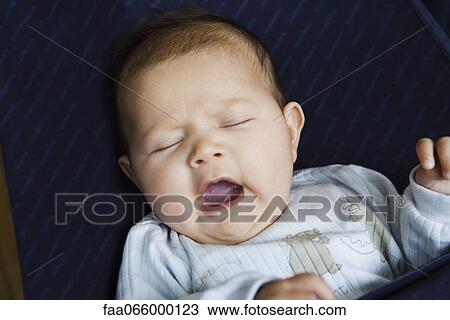 Stock Image - Baby yawning. Fotosearch