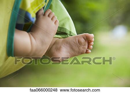Baby's feet View Large Photo Image Stock Photo - Baby's feet. Fotosearch