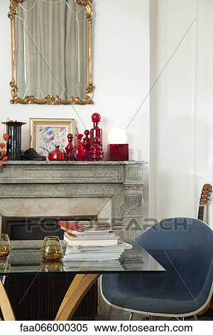 Books and magazines stacked on table in home interior View Large Photo Image Stock Photography - Books and magazines stacked on table in home interior. Fotosearch