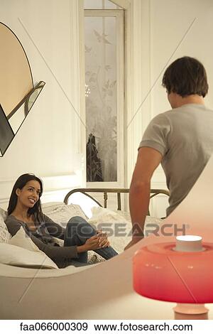 Stock Photo - Couple spending time together at home. Fotosearch