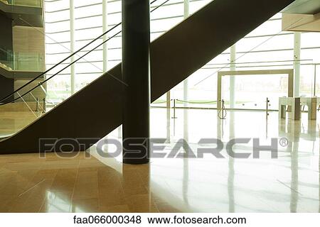 Stock Photo - Escalator in lobby. Fotosearch