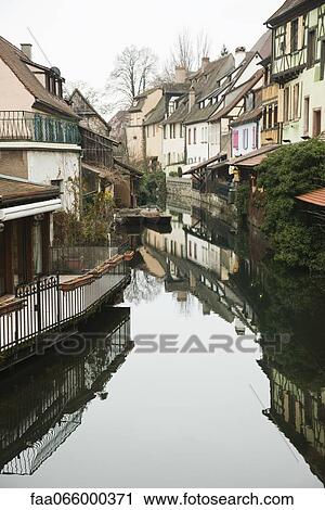 France, Colmar, Petite Venise, houses along reflective canal View Large Photo Image Stock Image - France, Colmar, Petite Venise, houses along reflective canal. Fotosearch