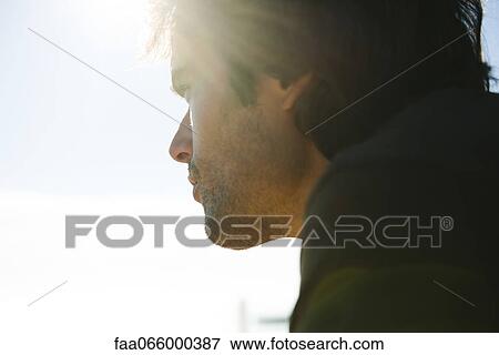 Man looking away in thought View Large Photo Image Stock Photo - Man looking away in thought. Fotosearch