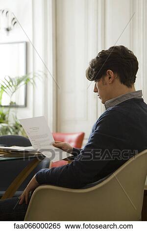 Man reading over employment contract View Large Photo Image Stock Photography - Man reading over employment contract. Fotosearch
