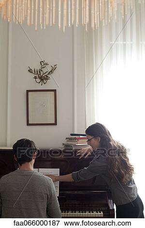 Man taking piano lessons View Large Photo Image Stock Photo - Man taking piano lessons. Fotosearch