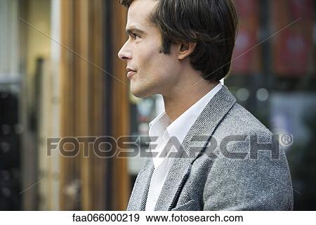 Man walking outdoors, profile View Large Photo Image Stock Photo - Man walking outdoors, profile. Fotosearch