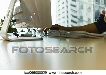 Person using desktop computer View Large Photo Image Stock Photo - Person using desktop computer. Fotosearch