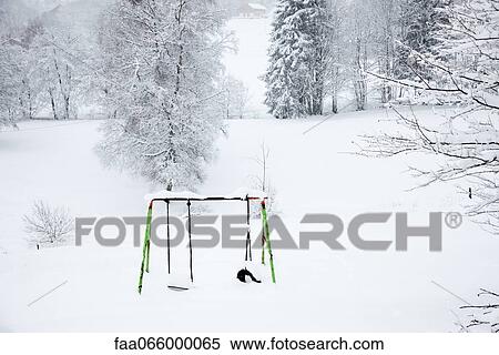 Snow-covered swingset View Large Photo Image Stock Photography - Snow-covered swingset. Fotosearch