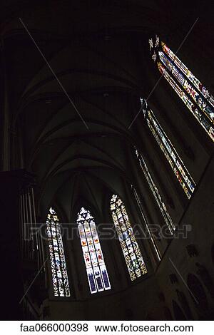Stained glass windows inside of Saint Martin church, Colmar, France View Large Photo Image Stock Photo - Stained glass windows inside of Saint Martin church, Colmar, France. Fotosearch