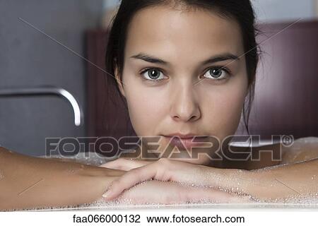 Woman relaxing in bath, portrait View Large Photo Image Stock Image - Woman relaxing in bath, portrait. Fotosearch