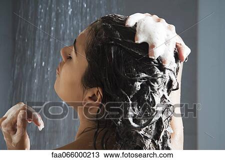 Woman washing her hair in shower View Large Photo Image Stock Image - Woman washing her hair in shower. Fotosearch