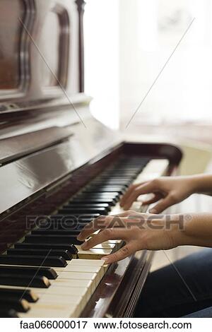 Woman's hands playing piano View Large Photo Image Stock Photo - Woman's hands playing piano. Fotosearch