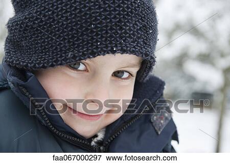 Boy in winter clothing, portrait View Large Photo Image Stock Photo - Boy in winter clothing, portrait. Fotosearch