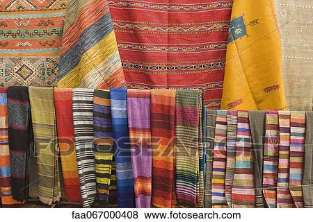 Brightly colored textiles, full frame View Large Photo Image Stock Photo - Brightly colored textiles, full frame. Fotosearch