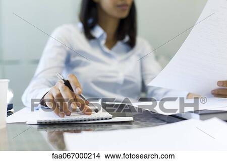 Businesswoman working, cropped View Large Photo Image Picture - Businesswoman working, cropped. Fotosearch