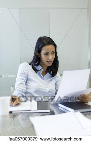 Businesswoman working View Large Photo Image Stock Photo - Businesswoman working. Fotosearch