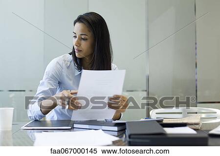 Stock Photography - Businesswoman working. Fotosearch