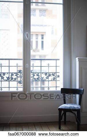 Stock Photo - Chair by window. Fotosearch