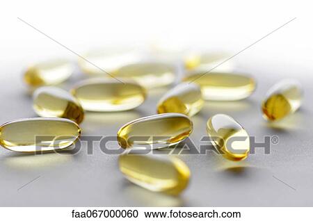 Cod liver oil capsules View Large Photo Image Stock Image - Cod liver oil capsules. Fotosearch