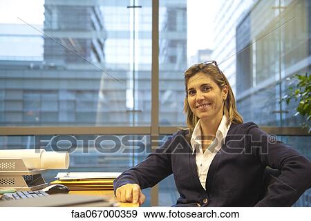 Stock Photo - Confident businesswoman, portrait. Fotosearch