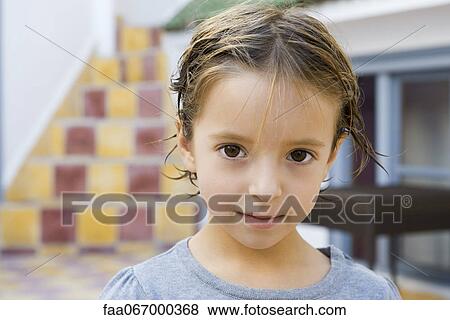 Little girl with wet hair, portrait View Large Photo Image Stock Photo - Little girl with wet hair, portrait. Fotosearch