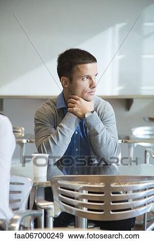 Man looking away in thought, portrait View Large Photo Image Stock Photo - Man looking away in thought, portrait. Fotosearch