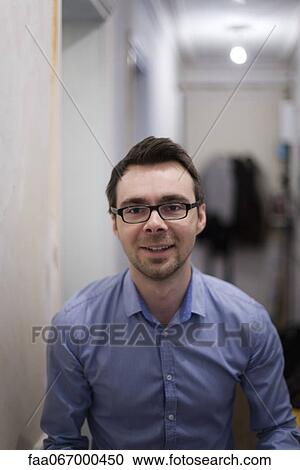 Stock Image - Mid-adult man, portrait. Fotosearch