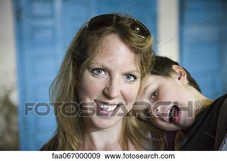 Stock Photo - Mother and young son, portrait. Fotosearch