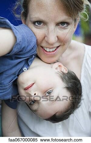 Mother and young son, portrait View Large Photo Image Stock Photography - Mother and young son, portrait. Fotosearch