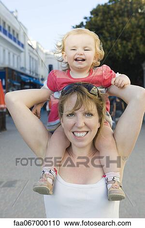 carrying baby on shoulders