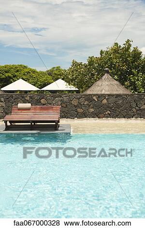 Resort swimming pool View Large Photo Image Stock Photo - Resort swimming pool. Fotosearch