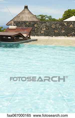 Stock Photography - Resort swimming pool. Fotosearch