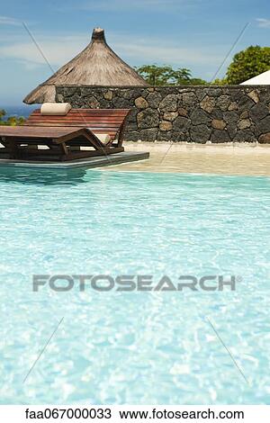 Swimming pool at resort View Large Photo Image Stock Image - Swimming pool at resort. Fotosearch