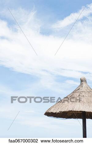 Thatched umbrella View Large Photo Image Stock Image - Thatched umbrella. Fotosearch