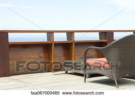Wicker patio furniture on deck View Large Photo Image Stock Photography - Wicker patio furniture on deck. Fotosearch