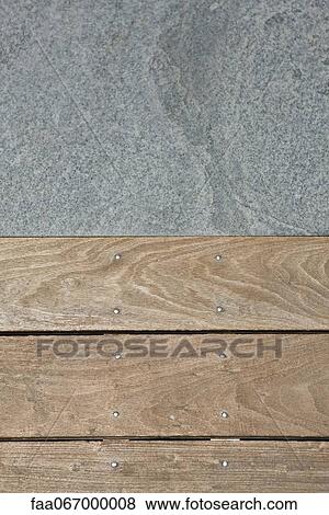 Stock Photo - Wooden flooring and paving stone. Fotosearch